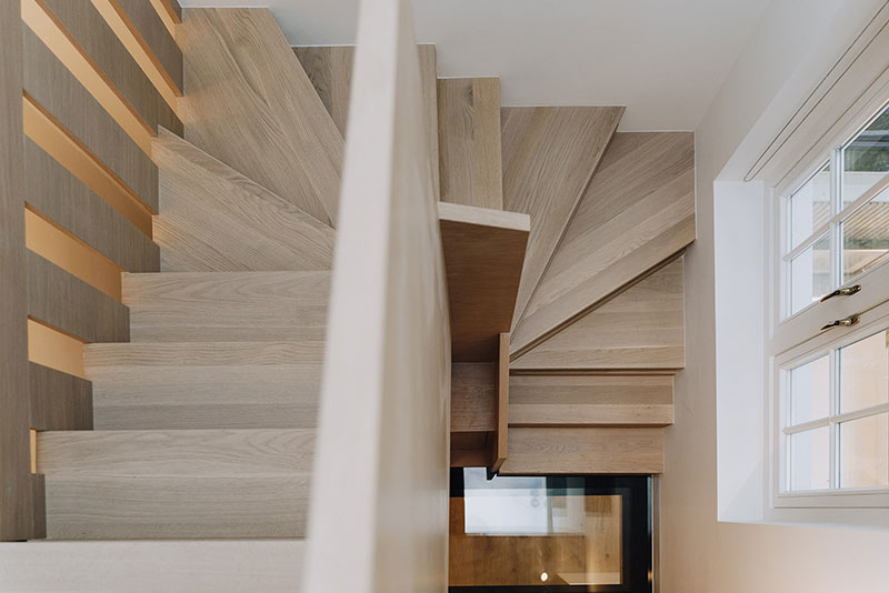 Bespoke oak staircase with timber treads and slatted detailing