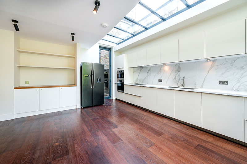 Kitchen extension with skylight, bespoke joinery and garden access